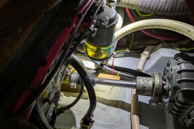 Laylay Yacht Photos Pics Engine compartment of 2003 Beneteau Oceanis Clipper 473, showing fuel filter and mechanical components.