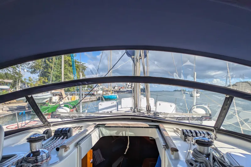 Laylay Yacht Photos Pics Cockpit view of 2003 Beneteau Oceanis Clipper 473 sailboat docked at marina.