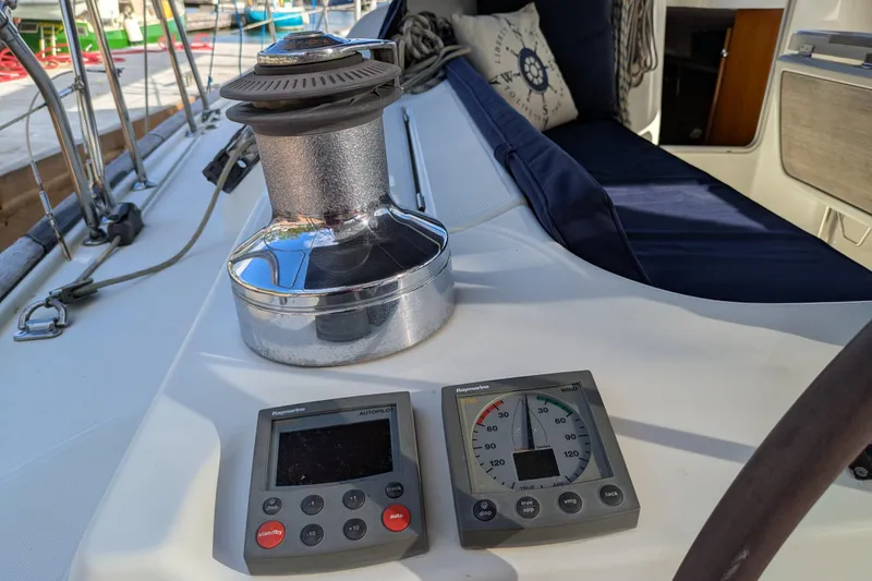 Laylay Yacht Photos Pics Beneteau Oceanis Clipper 473 yacht deck with winch and navigation instruments, 2003 model.