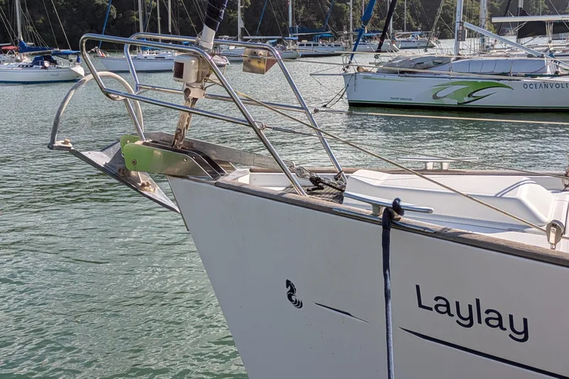 Laylay Yacht Photos Pics Bow of 2003 Beneteau Oceanis Clipper 473 sailboat named "Laylay" docked in marina.