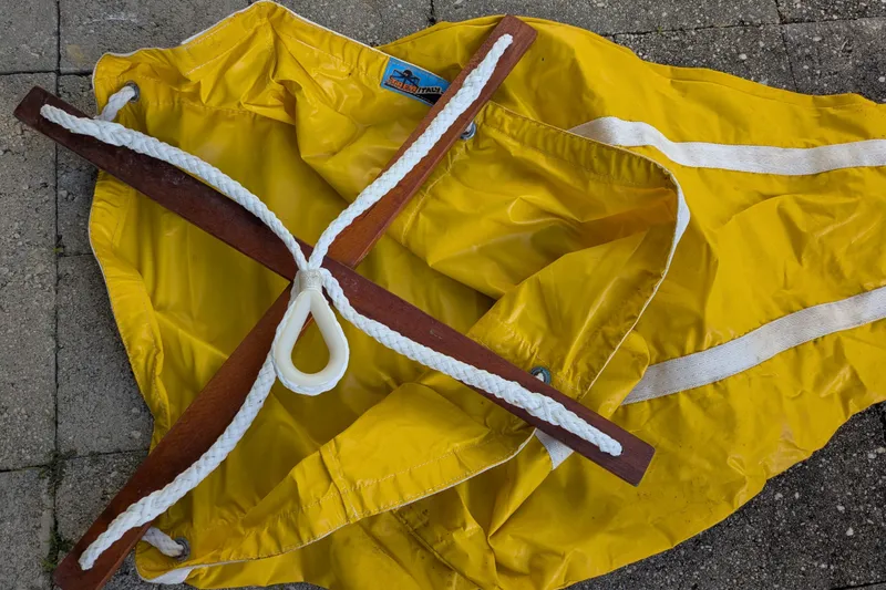 Laylay Yacht Photos Pics Yellow sail bag with ropes and wooden cross, Beneteau Oceanis Clipper 473, 2003 model.