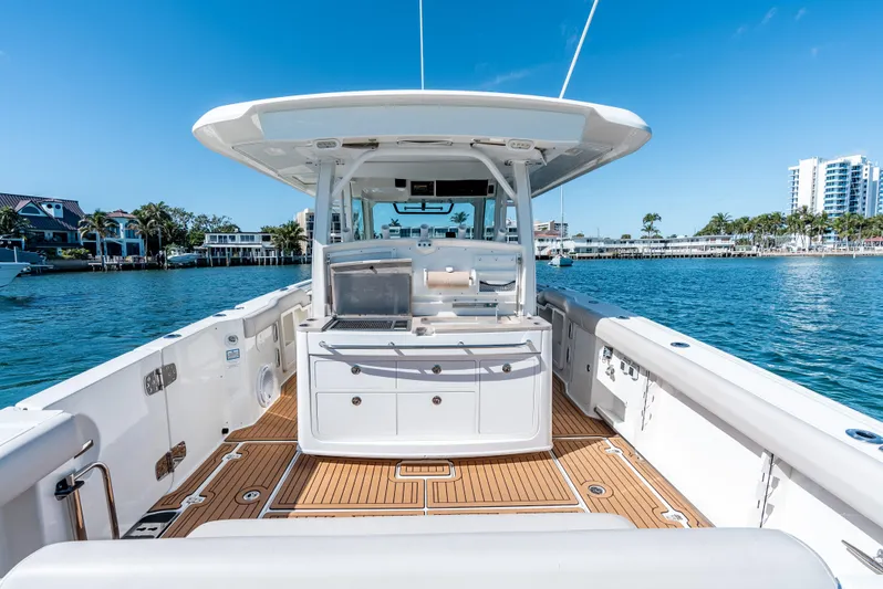  Yacht Photos Pics 2019 Boston Whaler 380 Outrage boat with spacious deck and modern amenities on the water.