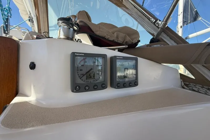  Yacht Photos Pics Cockpit of 1998 Tartan 3500 sailboat with Raymarine instruments and winch.