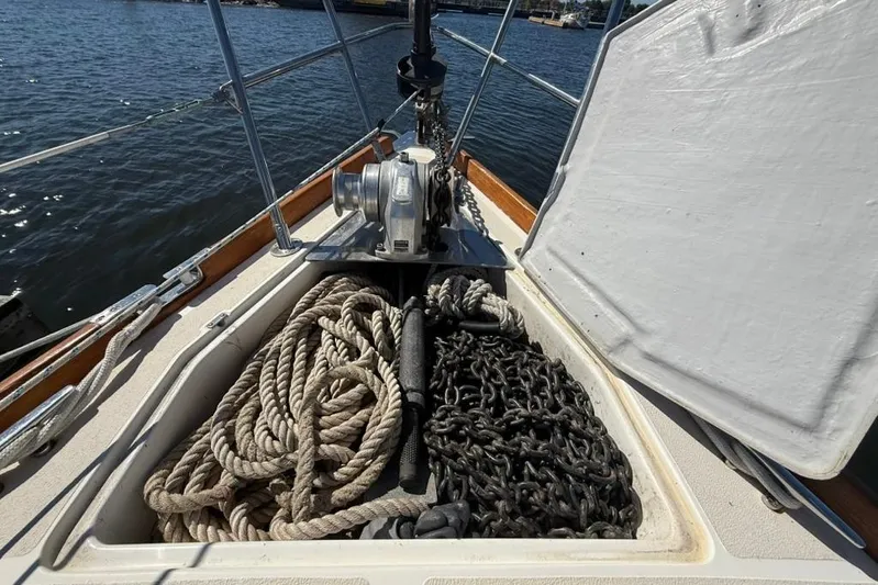  Yacht Photos Pics Anchor locker of 1998 Tartan 3500 sailboat with ropes and chains.
