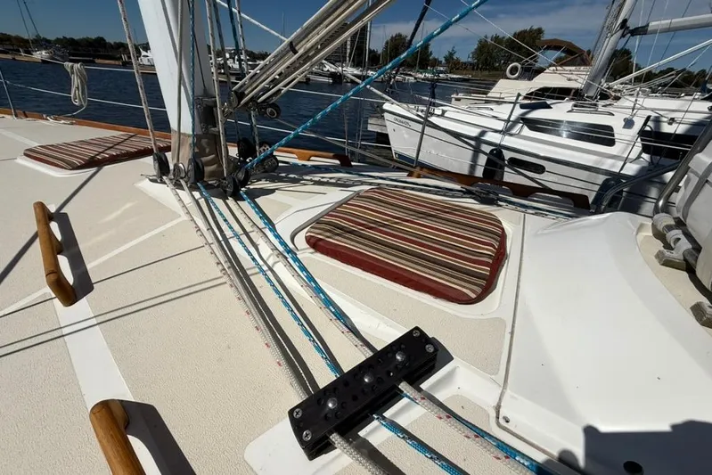  Yacht Photos Pics Deck of 1998 Tartan 3500 sailboat with striped cushions and rigging details.