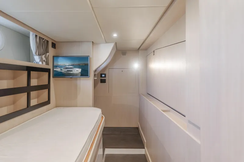 66 Magellano Yacht Photos Pics Interior of 2023 Azimut Magellano 66 yacht with modern design and wall-mounted TV.