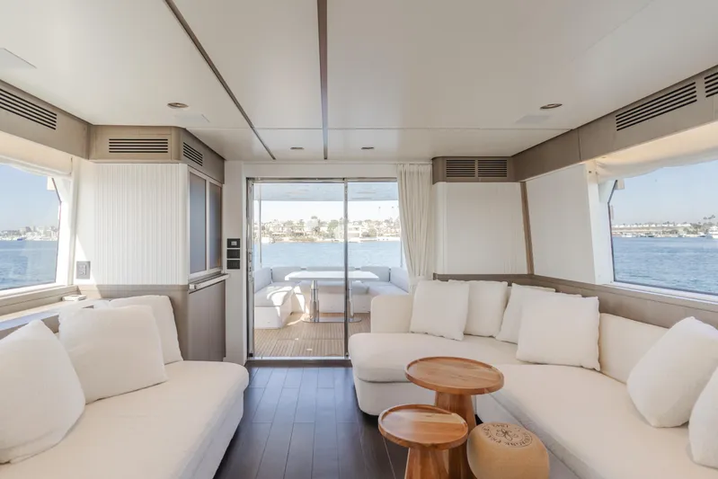 66 Magellano Yacht Photos Pics Luxurious interior of 2023 Azimut Magellano 66 yacht with elegant seating and ocean view.