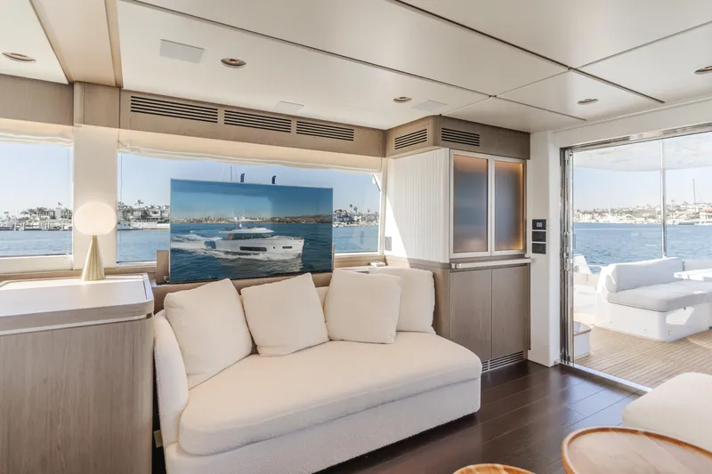 66 Magellano Yacht Photos Pics Luxurious interior of 2023 Azimut Magellano 66 yacht with elegant seating and ocean view.
