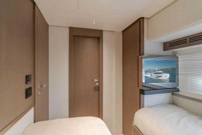 66 Magellano Yacht Photos Pics 2023 Azimut Magellano 66 yacht interior with modern design and window view.