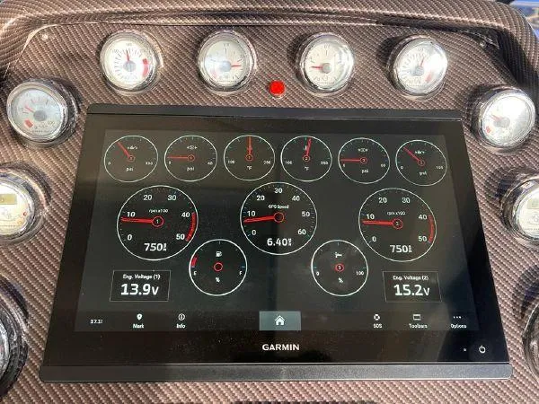  Yacht Photos Pics Dashboard of 2012 Azimut Atlantis 43 with Garmin display and analog gauges.