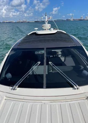  Yacht Photos Pics Azimut Atlantis 43 yacht, 2012 model, on calm waters with a clear sky backdrop.
