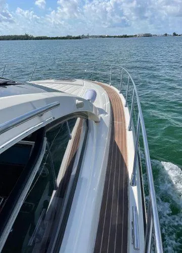  Yacht Photos Pics Azimut Atlantis 43 yacht cruising on open water, 2012 model, sunny day.