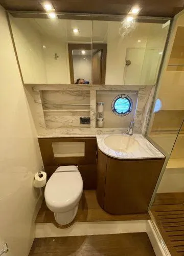  Yacht Photos Pics Luxurious bathroom in 2012 Azimut Atlantis 43 yacht with modern fixtures and elegant design.