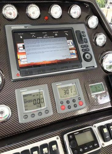  Yacht Photos Pics Control panel of a 2012 Azimut Atlantis 43 yacht with navigation instruments and gauges.