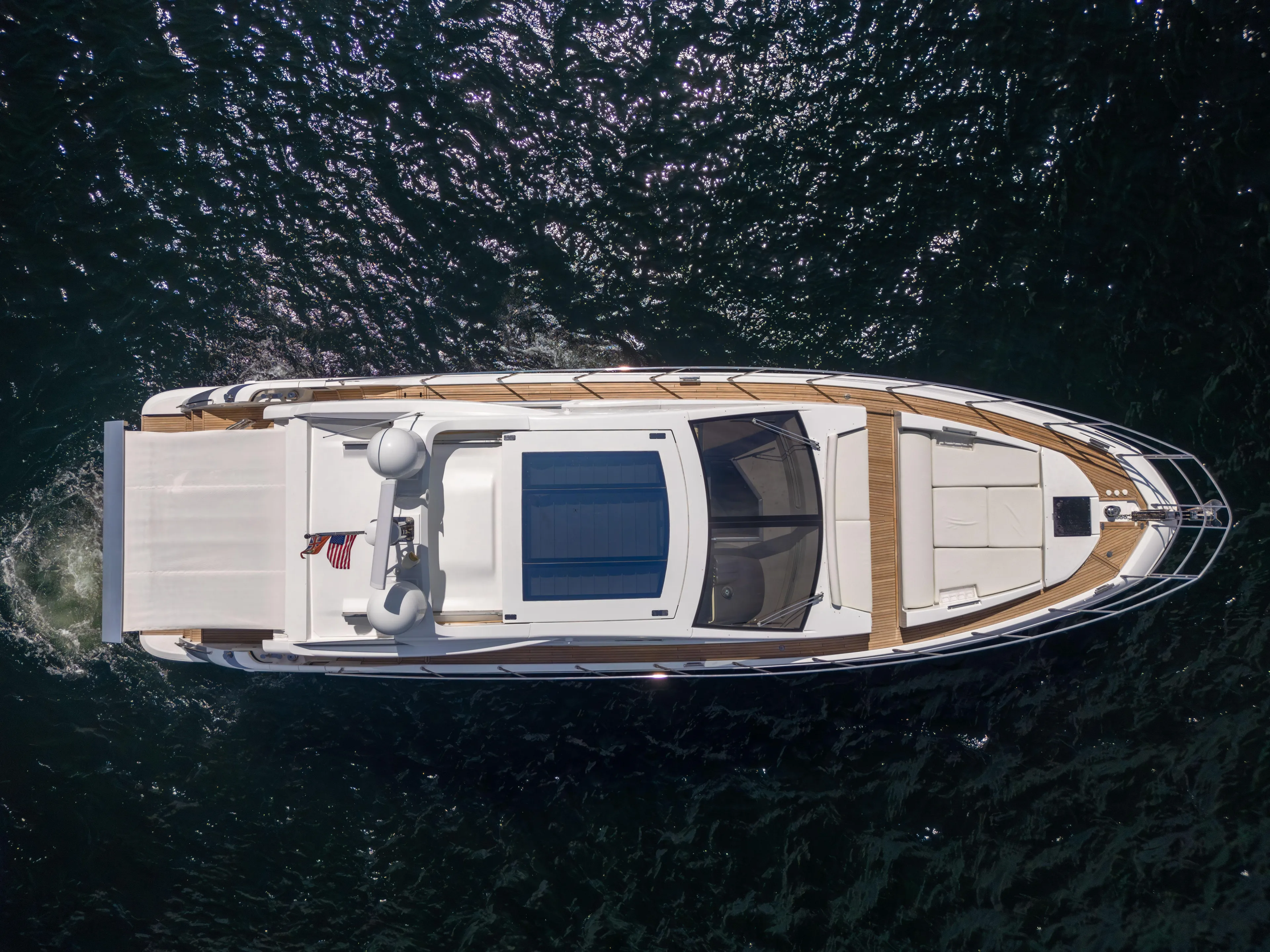 Ey IV Yacht Photos Pics Overhead view of 2016 Azimut 55S yacht cruising on water.