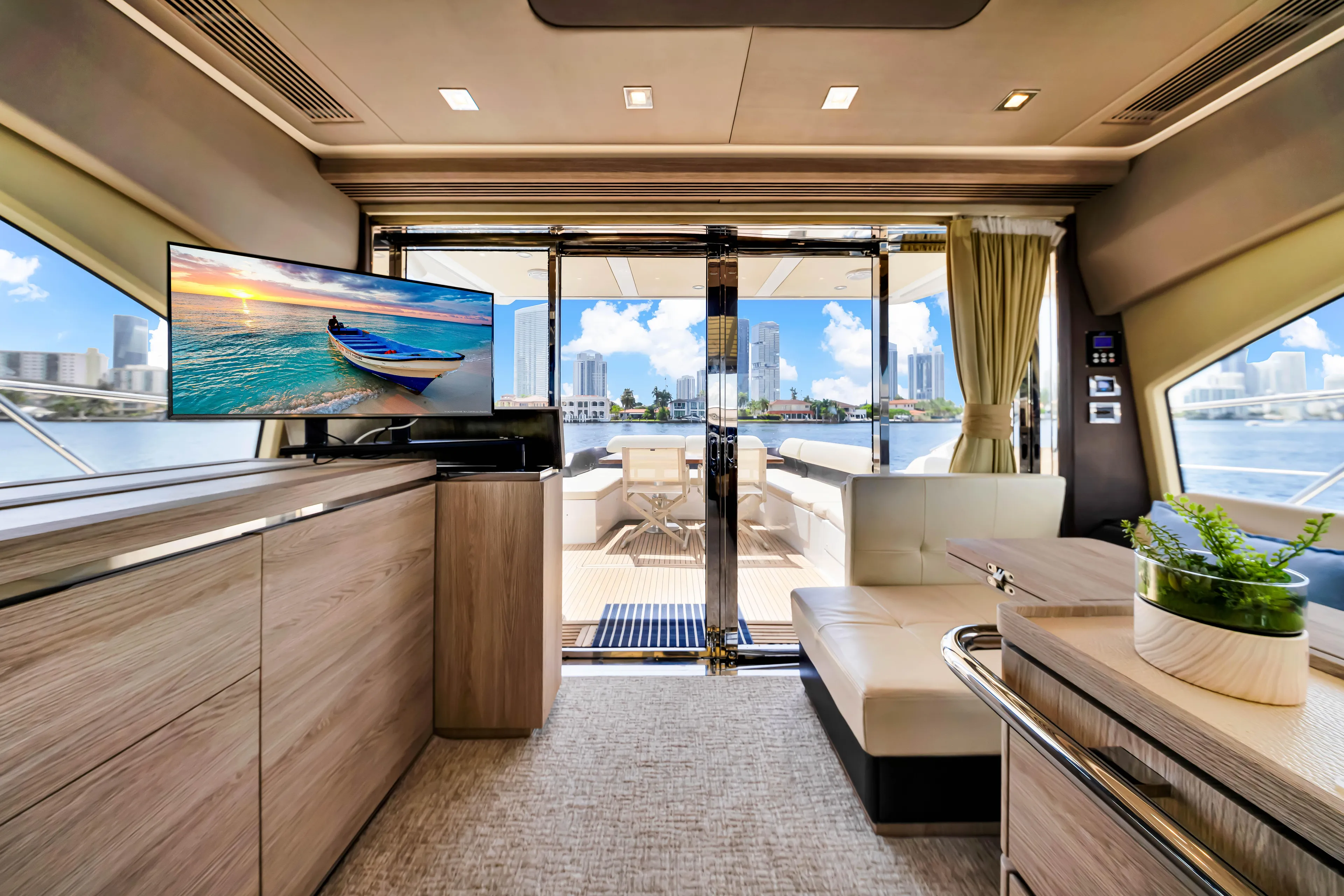 Ey IV Yacht Photos Pics Luxurious interior of 2016 Azimut 55S yacht with modern decor and waterfront view.