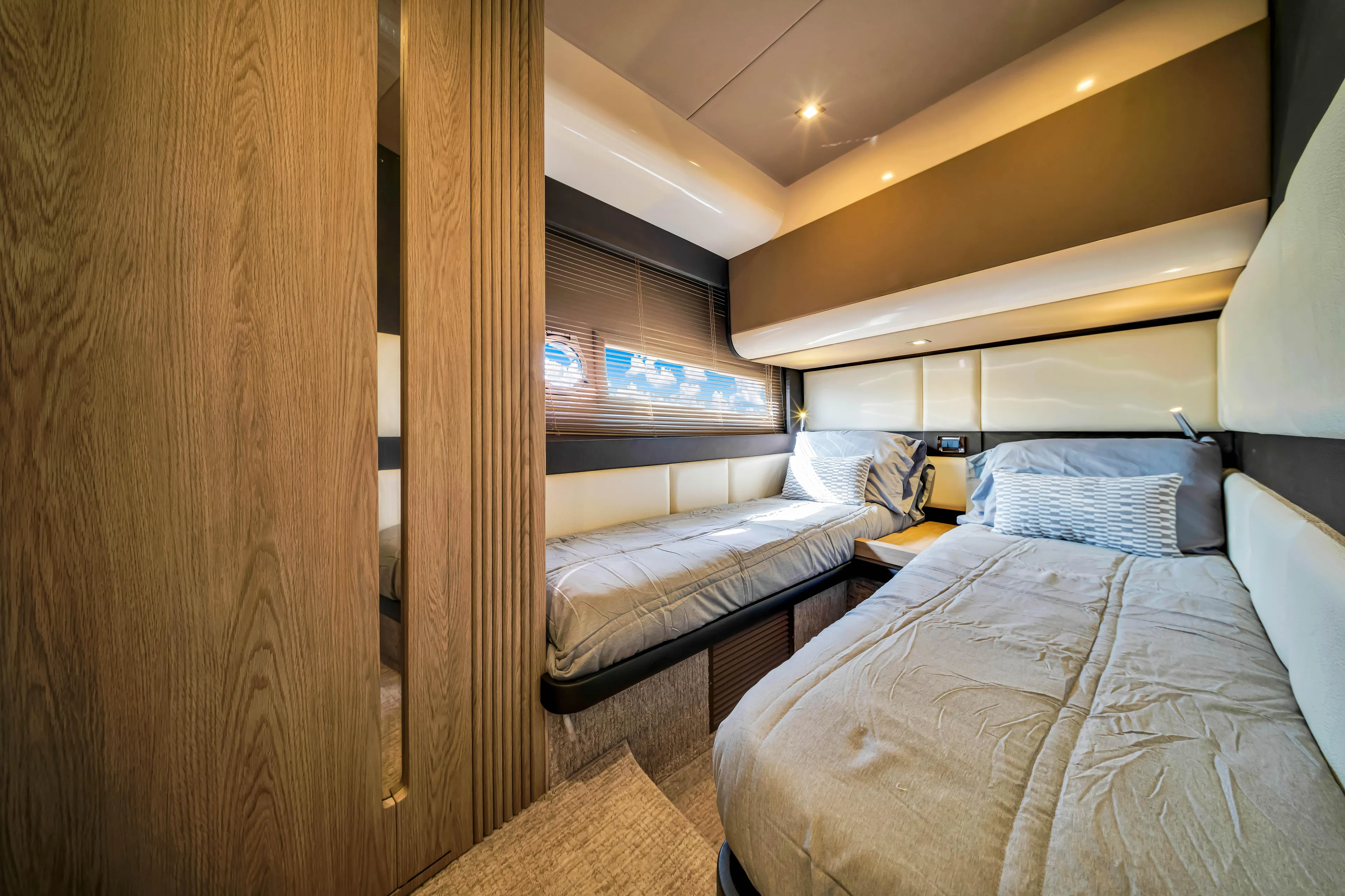 Ey IV Yacht Photos Pics Luxurious 2016 Azimut 55S yacht cabin with twin beds and modern interior design.