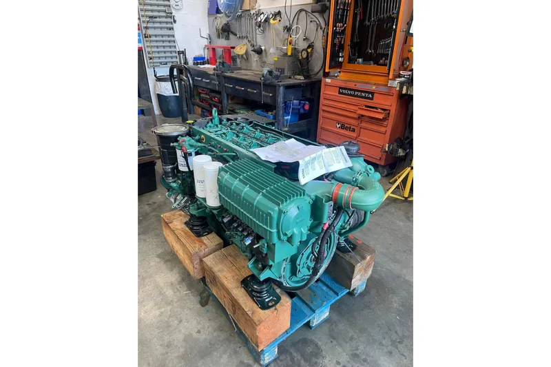  Yacht Photos Pics Engine of a 2016 Cranchi Atlantique 43 in a workshop setting.