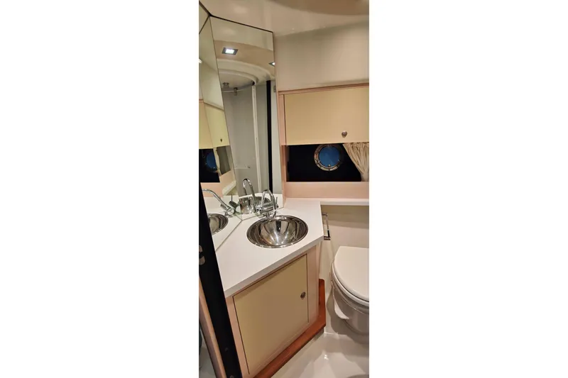  Yacht Photos Pics Luxurious bathroom in 2016 Cranchi Atlantique 43 yacht with modern fixtures.