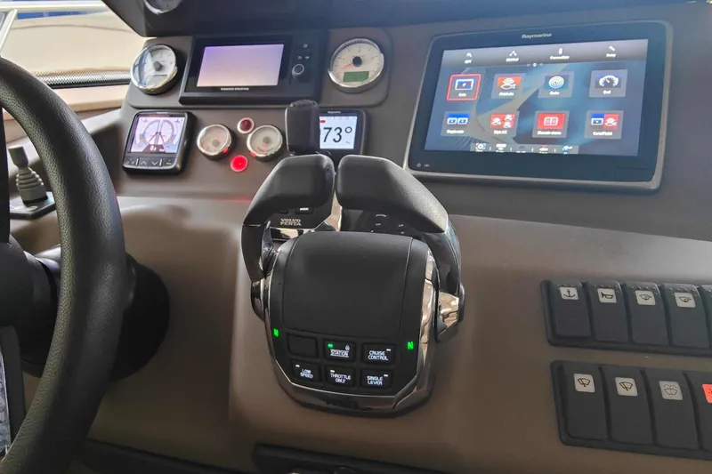  Yacht Photos Pics Control panel of 2016 Cranchi Atlantique 43 yacht with advanced navigation systems.