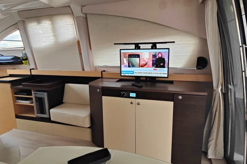  Yacht Photos Pics Luxurious interior of 2016 Cranchi Atlantique 43 yacht with modern entertainment system.