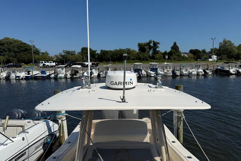  Yacht Photos Pics 2017 Grady-White Canyon 271 FS boat docked at marina with Garmin equipment.