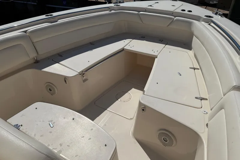  Yacht Photos Pics 2017 Grady-White Canyon 271 FS boat interior with spacious seating and storage compartments.