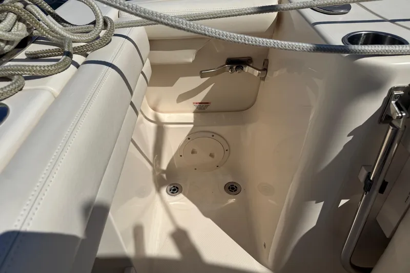  Yacht Photos Pics Interior view of 2017 Grady-White Canyon 271 FS boat, featuring seating and cup holders.