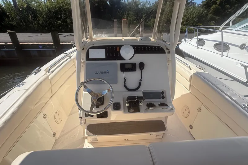  Yacht Photos Pics 2017 Grady-White Canyon 271 FS boat console with Garmin navigation system.