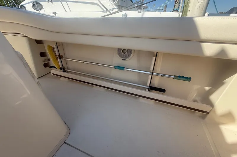  Yacht Photos Pics 2017 Grady-White Canyon 271 FS boat interior storage with cleaning tools.