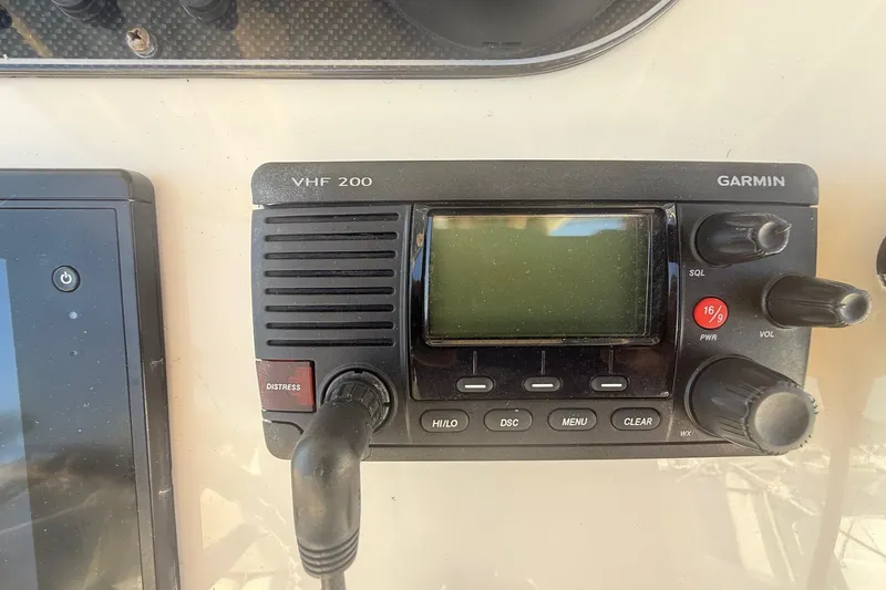  Yacht Photos Pics Garmin VHF 200 radio on 2017 Grady-White Canyon 271 FS boat dashboard.