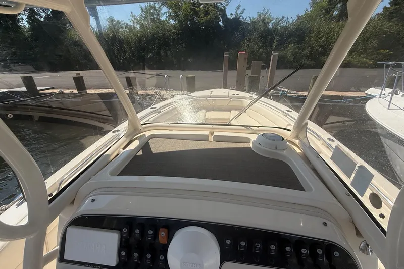  Yacht Photos Pics 2017 Grady-White Canyon 271 FS boat dashboard view at dock.