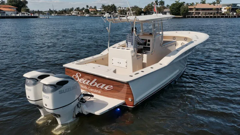 Seabae Yacht Photos Pics 2019 Custom Carolina 30 Open boat with twin Suzuki engines on the water.