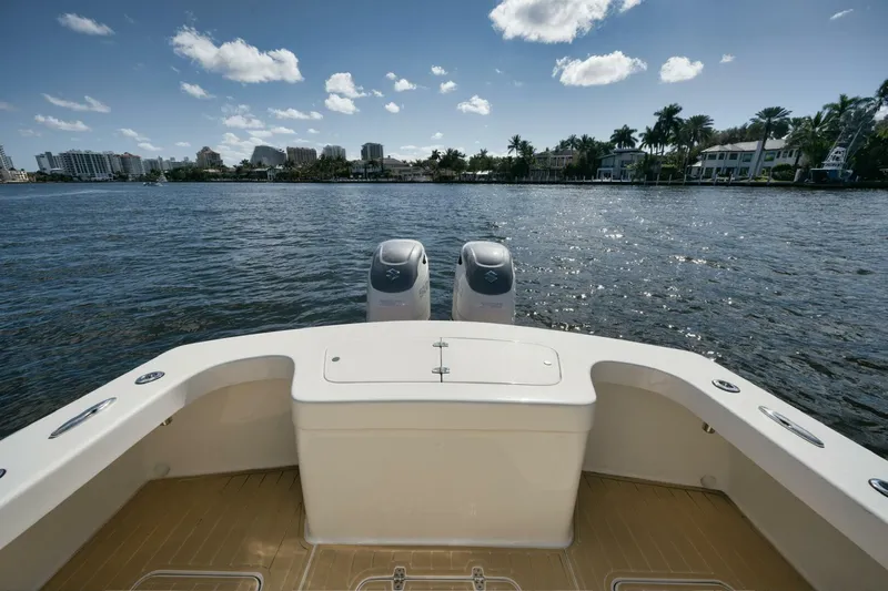 Seabae Yacht Photos Pics 2019 Custom Carolina 30 Open boat on water, featuring dual engines and scenic waterfront view.