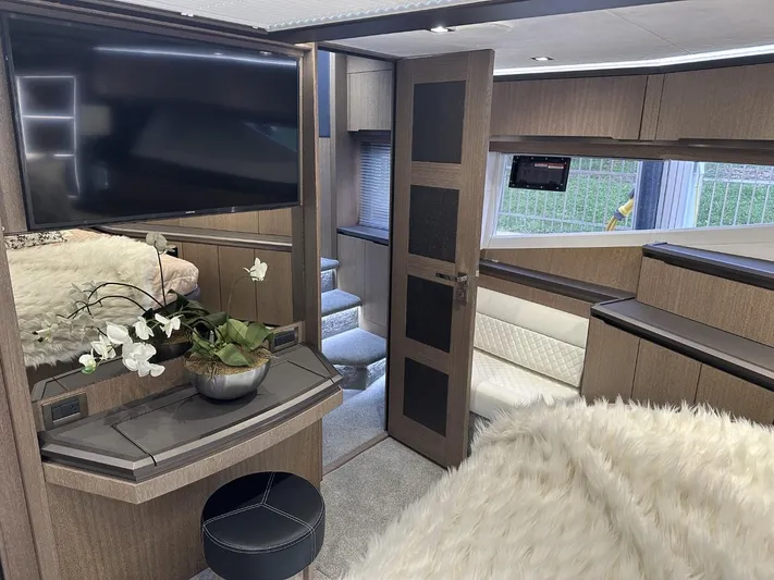  Yacht Photos Pics Luxurious interior of 2019 Galeon 650 Sky yacht with modern decor and plush furnishings.