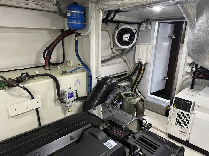  Yacht Photos Pics Engine room of 2019 Galeon 650 Sky yacht, featuring mechanical components and wiring.