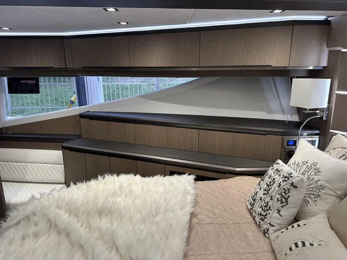  Yacht Photos Pics Luxurious interior of 2019 Galeon 650 Sky yacht with plush bedding and modern design.