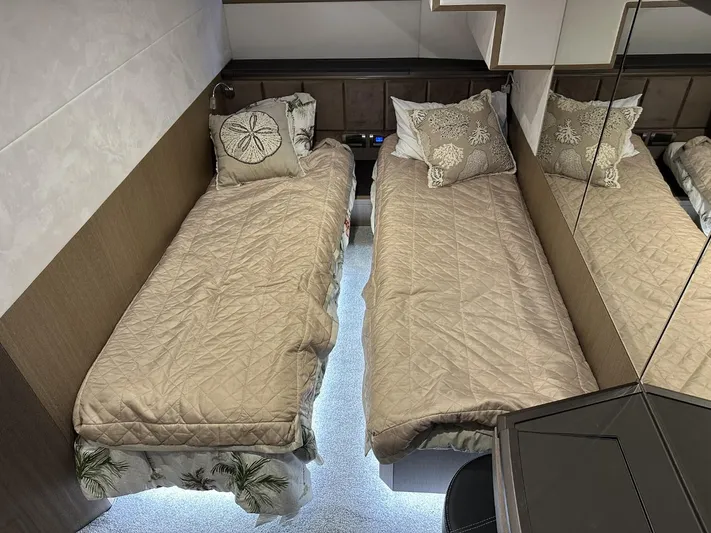  Yacht Photos Pics Twin beds in 2019 Galeon 650 Sky yacht cabin with beige bedding and decorative pillows.