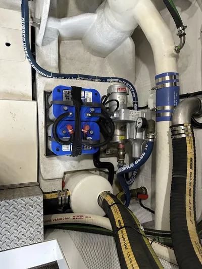  Yacht Photos Pics Engine compartment of 2019 Galeon 650 Sky yacht with hoses and components.
