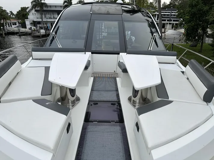  Yacht Photos Pics 2019 Galeon 650 Sky yacht with sleek deck design and modern seating arrangement.