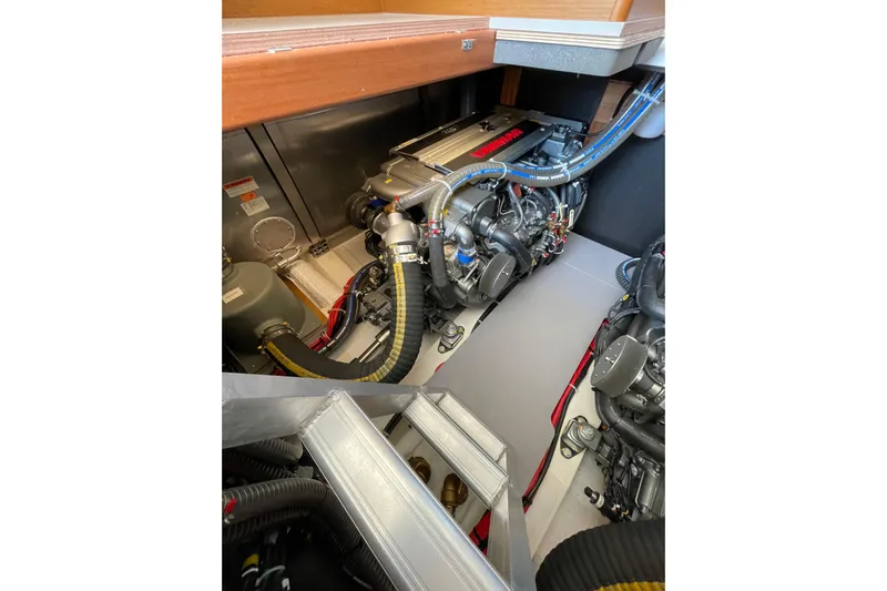  Yacht Photos Pics Engine room of 2025 Beneteau Swift Trawler 41 Fly, showcasing modern machinery.