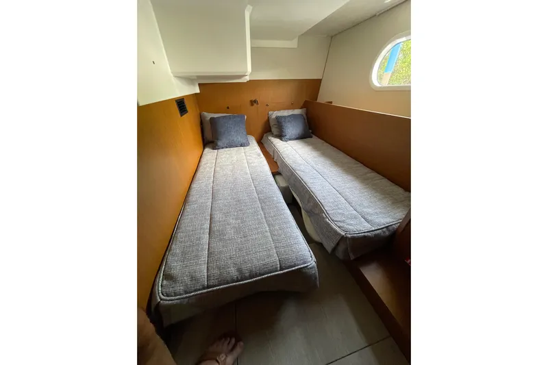  Yacht Photos Pics 2025 Beneteau Swift Trawler 41 Fly cabin with twin beds and modern design.