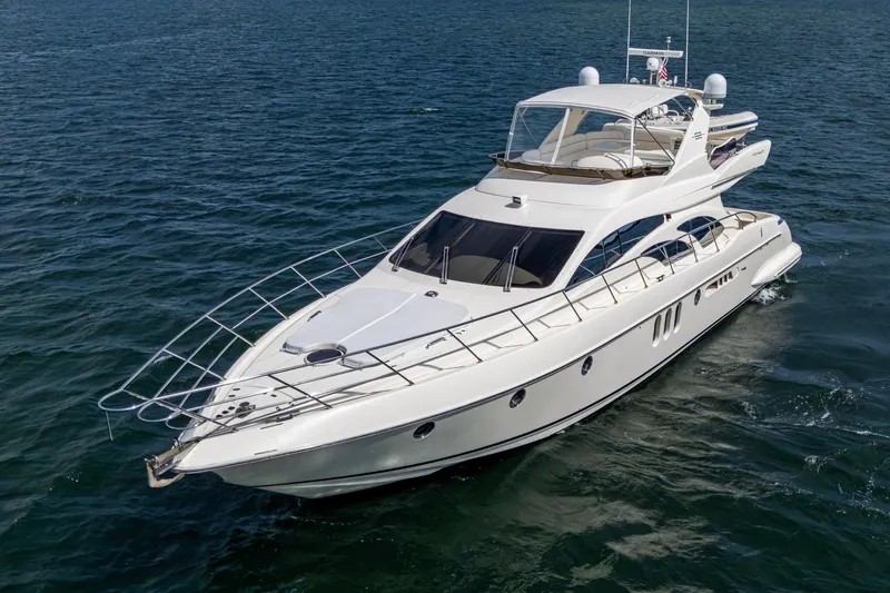 To Life! Yacht Photos Pics 2005 Azimut Fly 62 yacht cruising on open water.