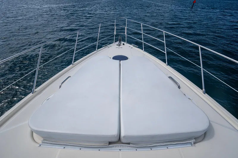 To Life! Yacht Photos Pics Bow view of 2005 Azimut Fly 62 yacht on open water.