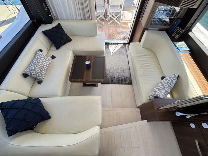 Skye Yacht Photos Pics Luxurious interior of 2019 Azimut Fly 50 yacht with elegant seating and decor.