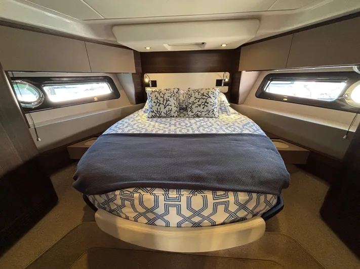 Skye Yacht Photos Pics Luxurious bedroom interior of 2019 Azimut Fly 50 yacht with elegant bedding and modern design.