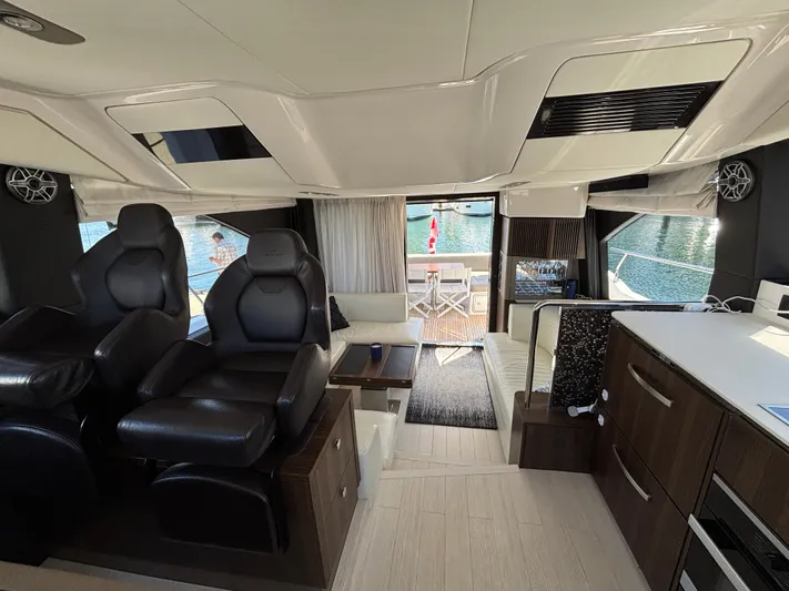 Skye Yacht Photos Pics Luxurious interior of 2019 Azimut Fly 50 yacht with modern seating and elegant design.
