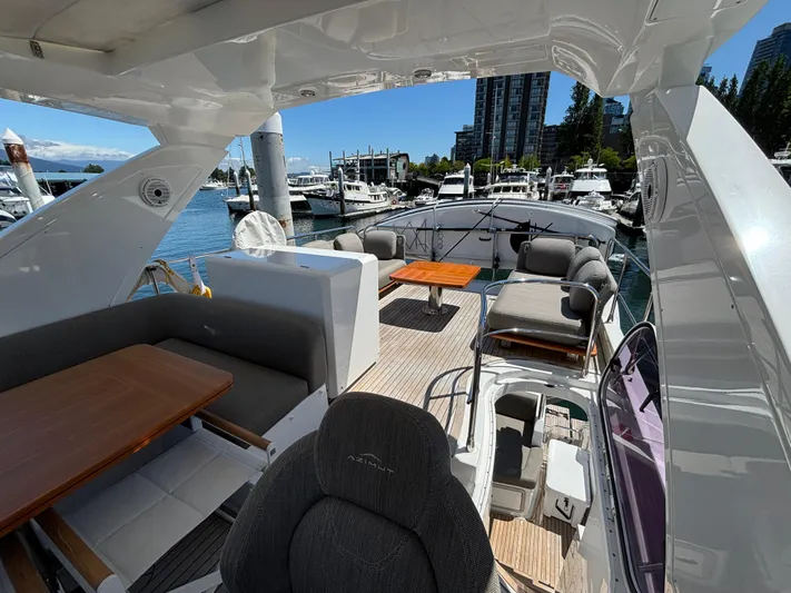 Skye Yacht Photos Pics Luxurious 2019 Azimut Fly 50 yacht interior with elegant seating and marina view.