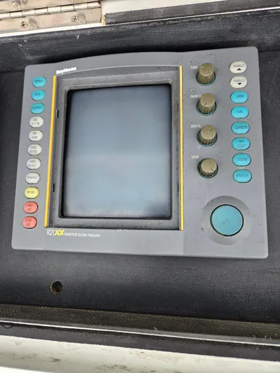 Bad To The Bone Yacht Photos Pics Raytheon R21XX raster scan radar on 1995 Egg Harbor Golden Egg 42 boat.