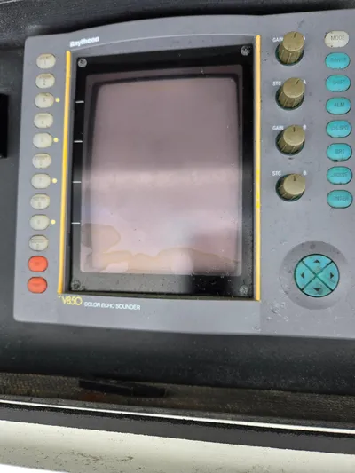 Bad To The Bone Yacht Photos Pics Raytheon V850 color echo sounder on 1995 Egg Harbor Golden Egg 42 boat.